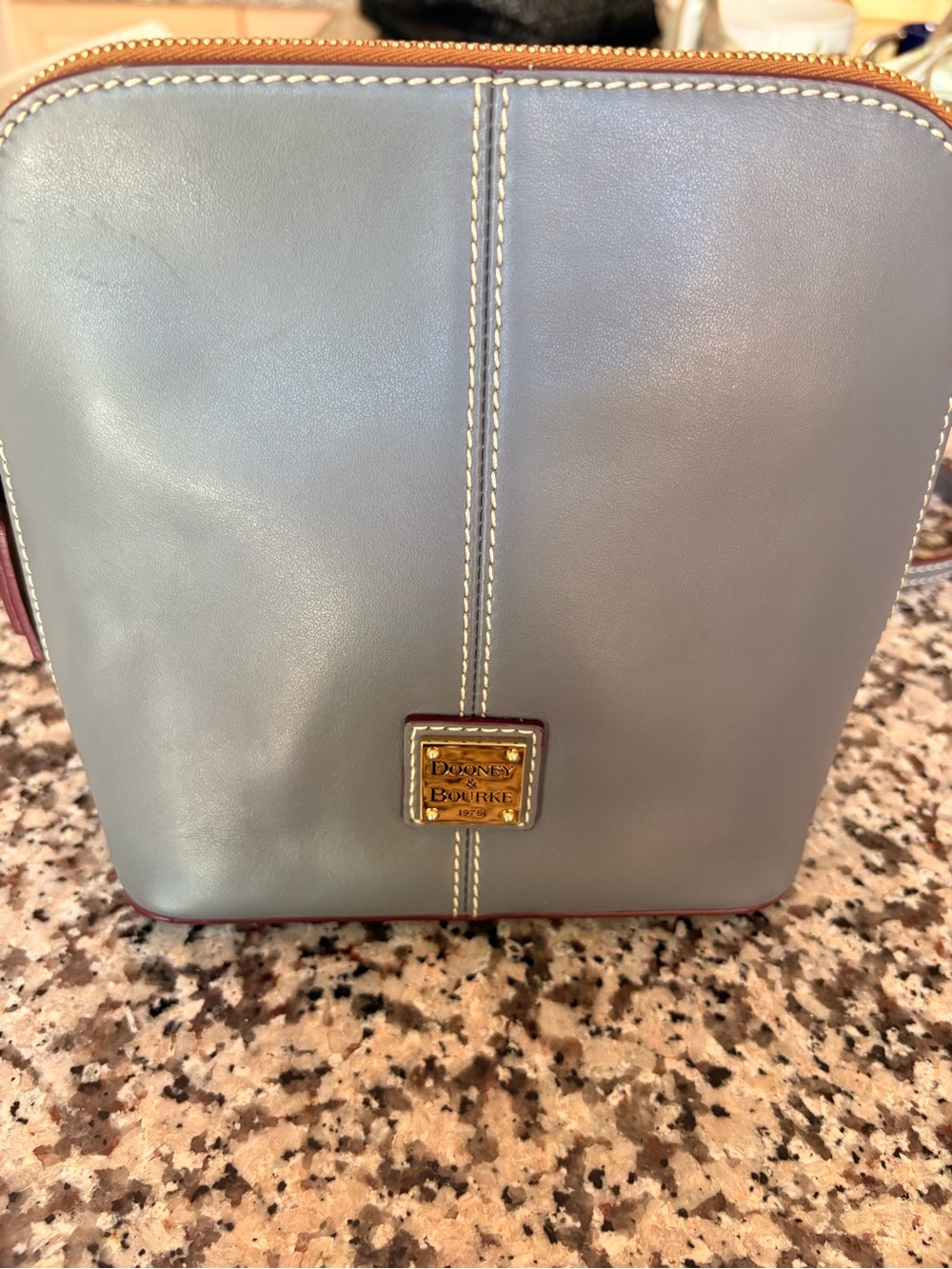 Dooney & Bourke Gray Leather Vertical Zip Crossbody with Gold Plaque